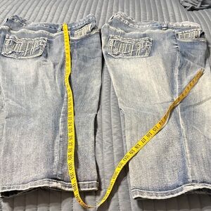 Two (2) pair identical Maurice’s capris, 
Sz 20